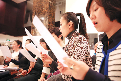 Chinese members of the chorus sing Russian songs, in Russian.