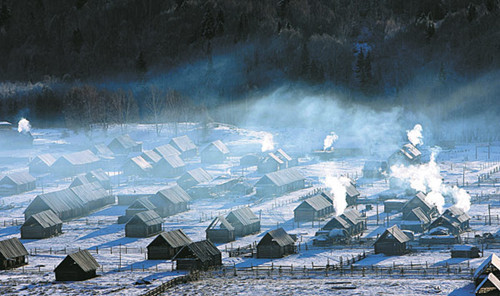 Tuwa villages are covered in a blanket of early winter snow. Zhang Wencheng / For China Daily