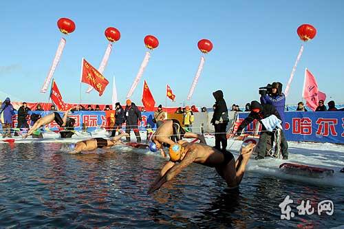 Ice swimmers shouted to encourage themselves while walking towards the pool in the middle of the Songhua River, half-naked in temperatures of minus 25 degrees Celcius.