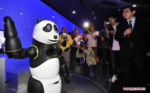 A giant panda robot is displayed in a newly inaugurated robot pavilion at Taipei Expo Park in Taipei, southeast China's Taiwan, February 6, 2013.  (Xinhua/Wu Ching-teng)