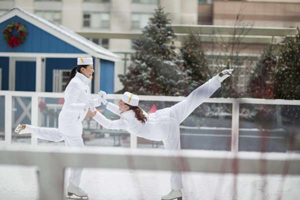 Surrounded by twinkling Christmas lights, The Peninsula Shanghai's skating rink is tucked into a pine tree winter wonderland and bathed in festive music. 