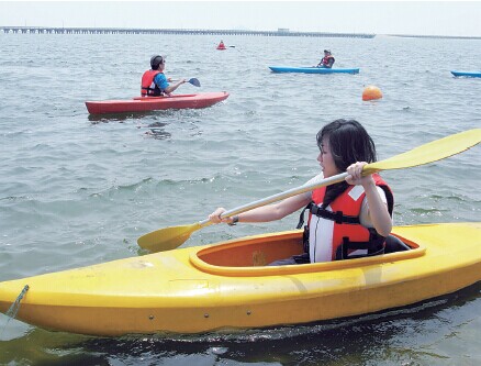 Kayaking at Jinshan City Beach. 