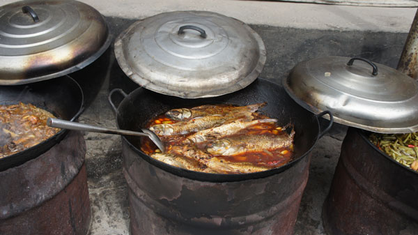 Fish is a specialty of the village. (Photo: Belle Taylor/China Daily)