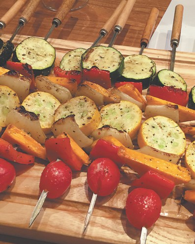 Summer vegetables and meats are a popular feature of braai. (Photo: Mike Peters/China Daily)