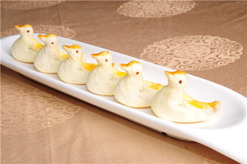 Duck-shaped desserts at Quanjude. (Photo by Jiang Dong/China Daily)