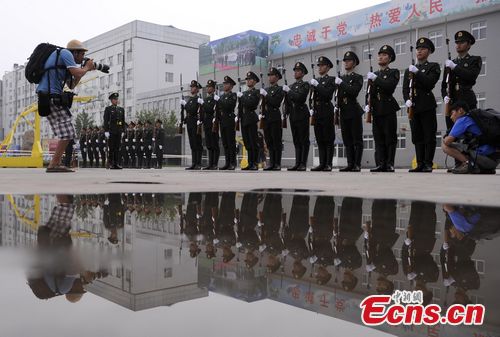 The honor guard of the army, navy, and airforce of the Chinese People's Liberation Army opened to 145 reporters from 77 domestic and foreign media organizations on July 21.