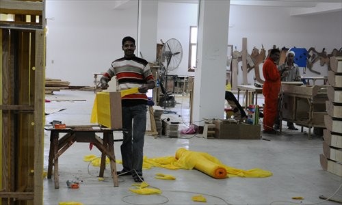 Local workers at a Chinese furniture factory. Photo: Wu Gang/GT