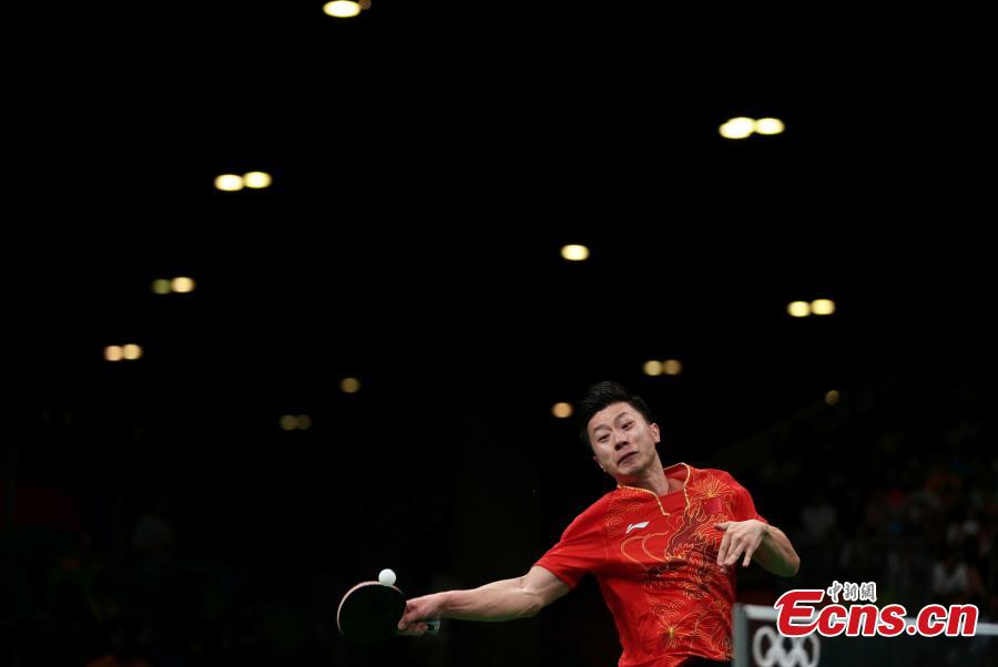 Ma Long of China competes in the men\'s table tennis team semifinal at the Rio Olympics in Rio de Janeiro, Brazil, Aug. 15, 2016. (Photo/Agencies)