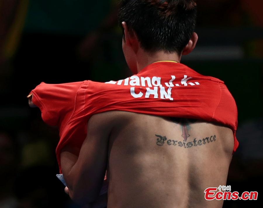 Zhang Jieke of China celebrates after winning in the men\'s table tennis team semifinal at the Rio Olympics in Rio de Janeiro, Brazil, Aug. 15, 2016. (Photo/Agencies)