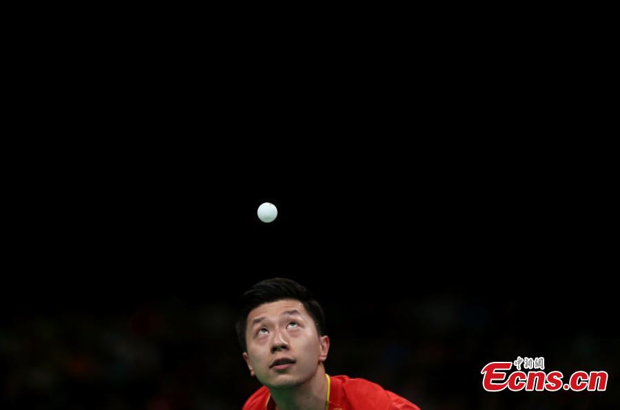 Ma Long of China competes in the men\'s table tennis team semifinal at the Rio Olympics in Rio de Janeiro, Brazil, Aug. 15, 2016. (Photo/Agencies)