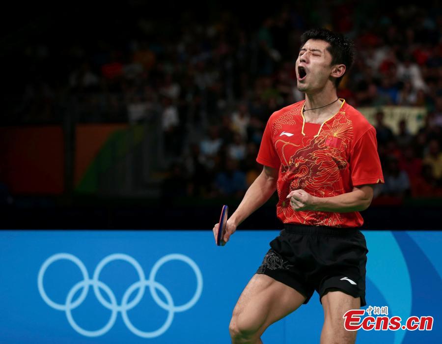 Chinese table tennis player Zhang Jike competes in the men\'s table tennis team semifinal at the Rio Olympics in Rio de Janeiro, Brazil, Aug. 15, 2016. After a tough first match between Zhang Jike and South Korea\'s Jeoung Youngsik, Ma Long quickly overcome Lee Sangsu in the second and it was wrapped up by Zhang and Xu Xin in the third and doubles match against Jeoung and Joo Saehyuk. (Photo/Agencies)