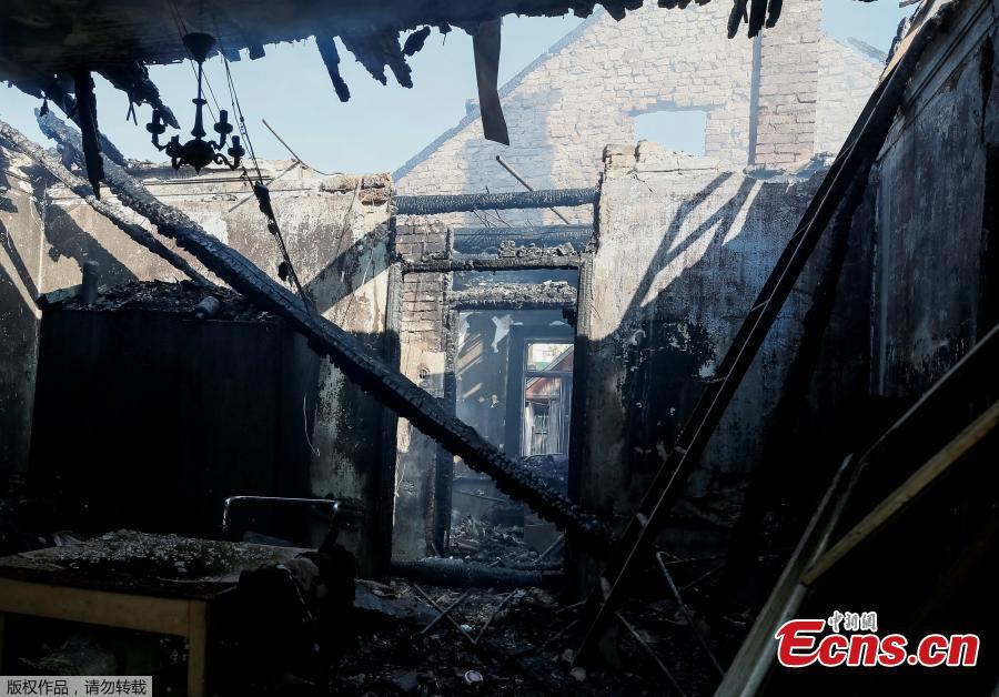 A destroyed house is seen near the warehouse storing ammunition for multiple rocket launcher systems at a military base in Kalynivka, Vinnytsia region, Ukraine September 27, 2017. (Photo/Agencies)