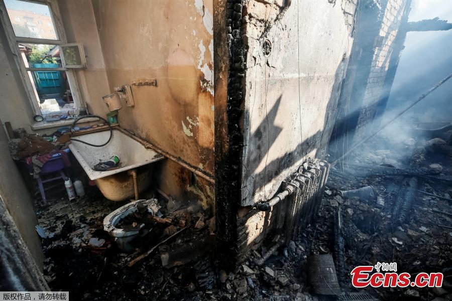 A destroyed house is seen near the warehouse storing ammunition for multiple rocket launcher systems at a military base in Kalynivka, Vinnytsia region, Ukraine September 27, 2017. (Photo/Agencies)