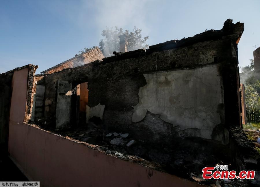 A destroyed house is seen near the warehouse storing ammunition for multiple rocket launcher systems at a military base in Kalynivka, Vinnytsia region, Ukraine September 27, 2017. (Photo/Agencies)