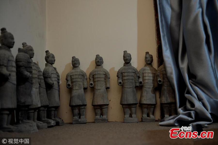 A warrior-style living room is shown in this picture. (Photo/VCG)

Ten years ago, Guo Zhihua was a cab driver in Xi\'an, home to the world-renowned Terracotta Warriors from the Qin Dynasty (221-206 BC). He loves them and came up with the idea of turning his three old houses into Terracotta Warrior-themed family hotels, spending 100,000 yuan ($15,600) to decorate his 260-square-meter properties with replicas of the famous artifacts. The interior design for the bedroom, bathroom and living room incorporates warriors, from miniature figures to those taller than human beings.