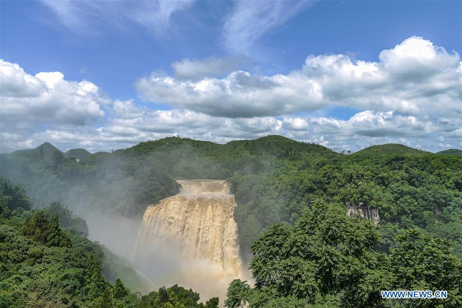 Photo taken on June 20, 2018 shows the Huangguoshu Waterfall in Anshun, southwest China\'s Guizhou Province. Affected by sustained rainfall, the Huangguoshu Waterfall on Wednesday saw its maximum flow in this year\'s flood season, with the flow rate reaching 395 cubic meters per second. (Xinhua/Cui Yu)