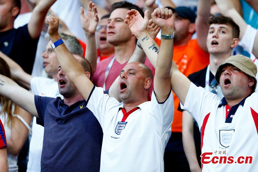 A fan reacts during the World Cup match between England and Belgium in Kaliningrad Stadium, Kaliningrad, Russia, June 28, 2018. Belgium remained unbeaten in Russia World Cup as they defeated England and will face Japan in the knockout stage. Belgium\'s Adnan Januzaj scored the only goal. (Photo: China News Service/Fu Tian)