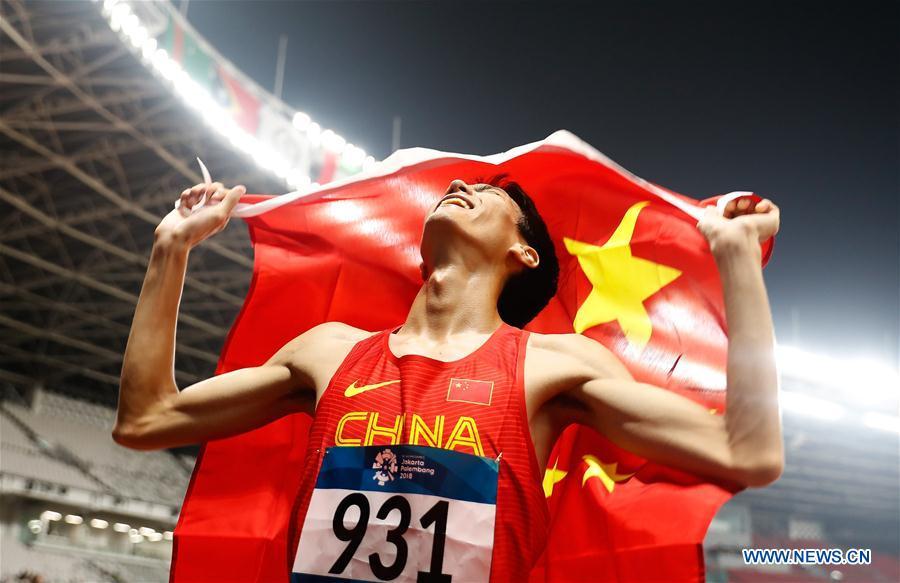 Wang Yu of China celebrates after the men\'s high jump final of athletics at the Asian Games 2018 in Jakarta, Indonesia on Aug. 27, 2018. (Xinhua/Wang Lili)