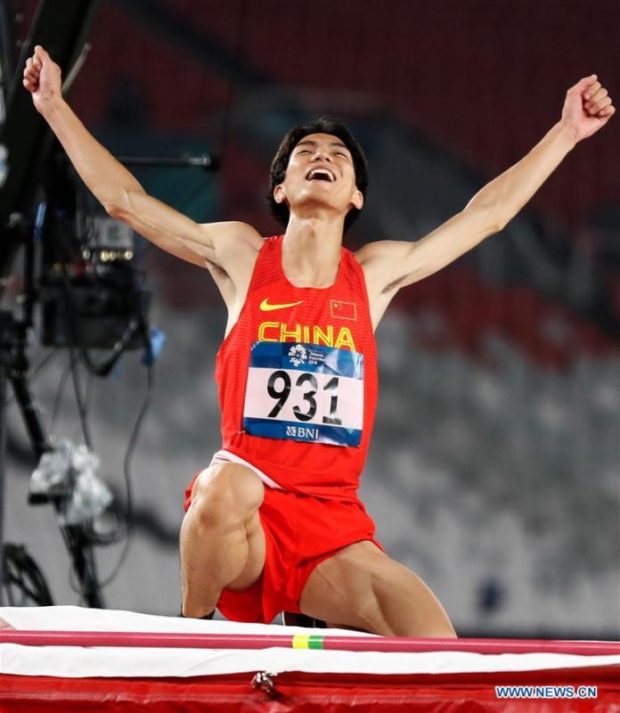 Wang Yu of China celebrates after the men\'s high jump final of athletics at the Asian Games 2018 in Jakarta, Indonesia on Aug. 27, 2018. (Xinhua/Wang Lili)