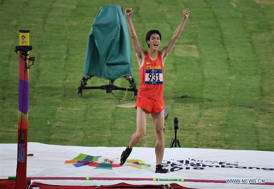 Wang Yu of China celebrates after the men\'s high jump final of athletics at the Asian Games 2018 in Jakarta, Indonesia on Aug. 27, 2018. (Xinhua/Du Yu)