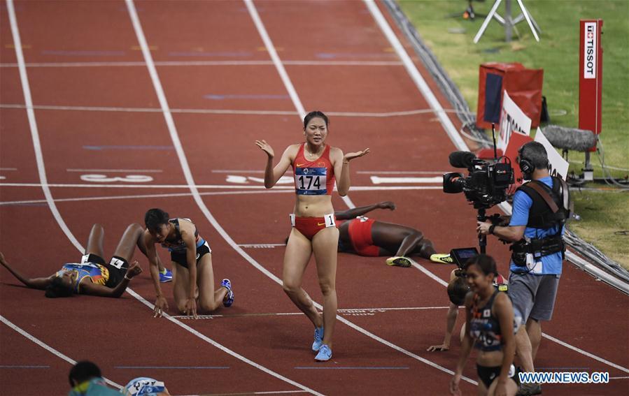 Wang Chunyu of China reacts after women\'s 800m final of athletics at the Asian Games 2018 in Jakarta, Indonesia on Aug. 28, 2018. Wang won the gold medal. (Xinhua/Huang Zongzhi)