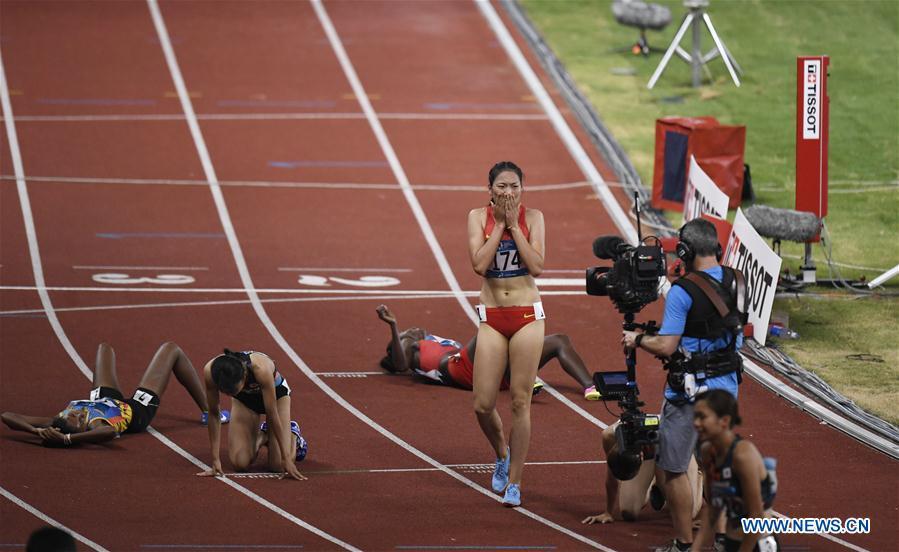 Wang Chunyu of China reacts after women\'s 800m final of athletics at the Asian Games 2018 in Jakarta, Indonesia on Aug. 28, 2018. Wang won the gold medal. (Xinhua/Huang Zongzhi)