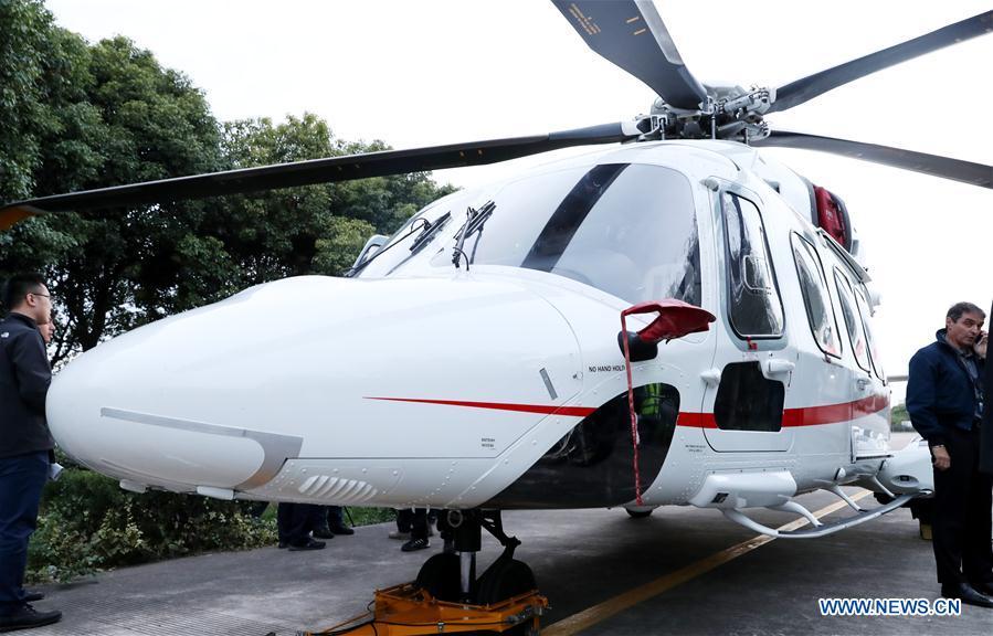 An AW189 helicopter manufactured by Leonardo from Italy lands in east China\'s Shanghai, Oct. 20, 2018. The helicopter will be exhibited at the upcoming China International Import Expo. (Xinhua/Fang Zhe)