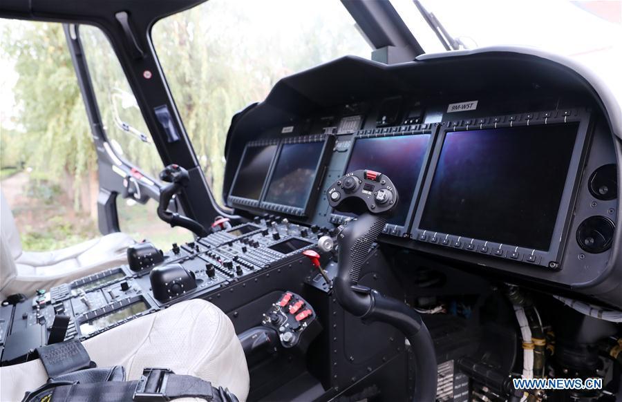 Photo shows the interior view of AW189 helicopter manufactured by Leonardo from Italy in east China\'s Shanghai, Oct. 20, 2018. The helicopter will be exhibited at the upcoming China International Import Expo. (Xinhua/Fang Zhe)