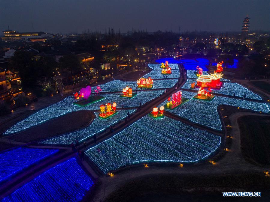 Aerial photo taken on Jan. 28, 2019 shows an area decorated with lanterns in Wuzhen, east China\'s Zhejiang Province. A local lantern festival, presenting over 330 lanterns, was held here before the Spring Festival, or the Chinese Lunar New Year, which falls on Feb. 5 this year. (Xinhua/Xu Yu)