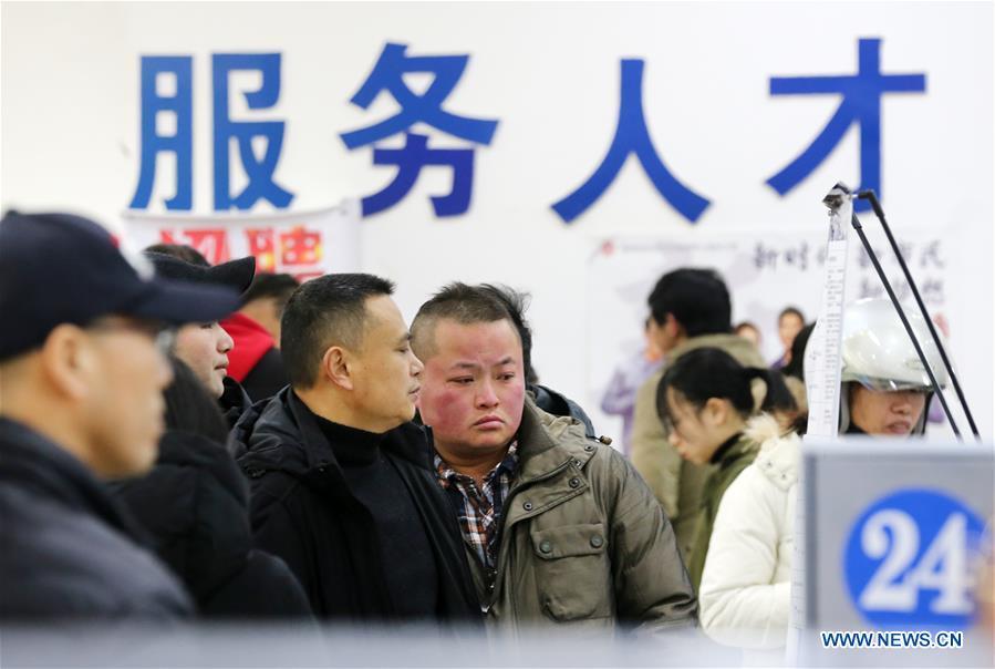 Job seekers are seen on a job fair in Nantong City, east China\'s Jiangsu Province, Feb. 12, 2019. Job fairs are held in multiple cities in China after the Spring Festival holiday. (Xinhua/Xu Congjun)