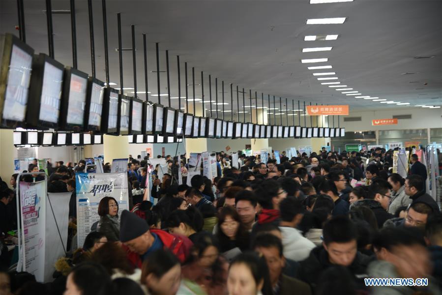 Job seekers are seen on a job fair in Zibo City, east China\'s Shandong Province, Feb. 12, 2019. Job fairs are held in multiple cities in China after the Spring Festival holiday. (Xinhua/Zhao Shengjian)