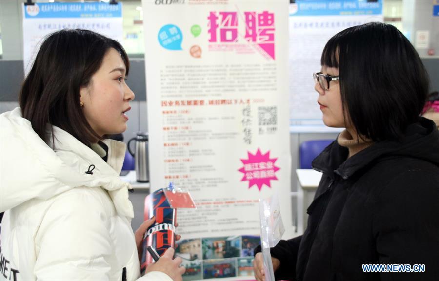 Job seekers are seen on a job fair in Suzhou, east China\'s Jiangsu Province, Feb. 12, 2019. Job fairs are held in multiple cities in China after the Spring Festival holiday. (Xinhua/Wang Jiankang)