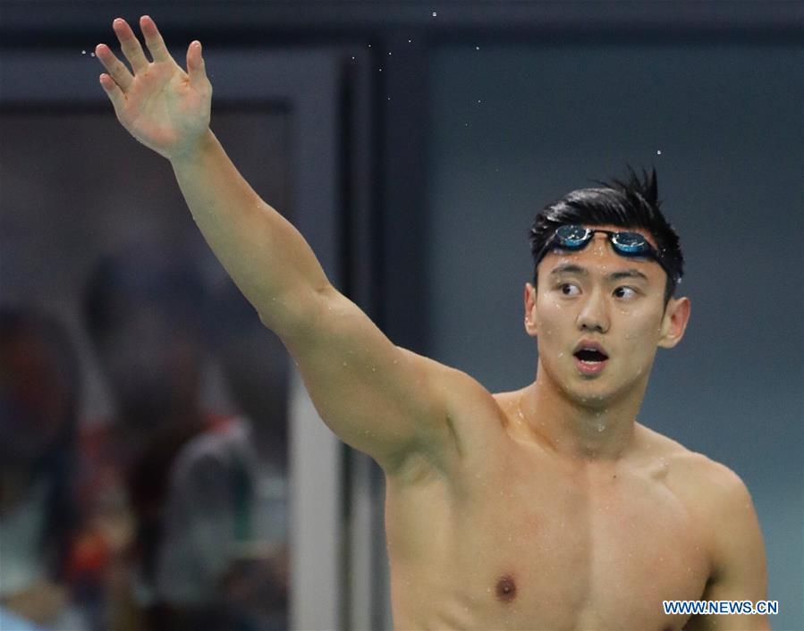 Ning Zetao of Henan reacts after the men\'s 100m freestyle swimming final at 13th Chinese National Games in North China\'s Tianjin, Sept. 4, 2017. Ning Zetao claimed the title with 47.92 seconds. (Photo/Xinhua)

Then things began going downhill. Ning was taken out of the national swimming team for participating in private commercial activities and over disputes with the team, and was sent back to his original Chinese Navy team for training in 2017.

Later that year, Ning broke his previous national record to surge to victory in the 100m freestyle at the short course swimming race in Queensland, Australia, finishing in 46.64 seconds. Ning also won the men\'s 50m freestyle gold medal in 21.77 seconds in Queensland.