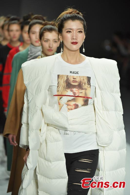 Models wear creations by brand GRAMOLINI during the 2019 Shenzhen Fashion Week in Shenzhen City, South China’s Guangdong Province, March 17, 2019. (Photo: China News Service/Chen Wen)