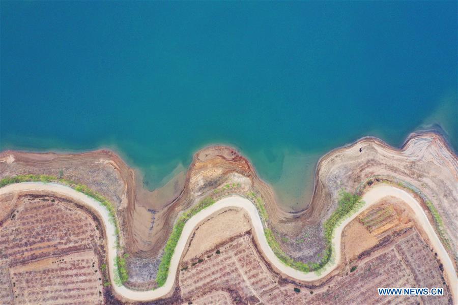 Aerial photo taken on March 27, 2019 shows the scenery of Xibaipo Township of Pingshan County, north China\'s Hebei Province. (Xinhua/Xing Guangli)