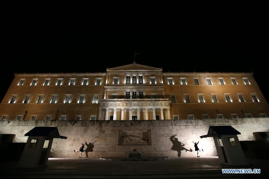 Photo taken on March 30, 2019 shows the lights on of the Greek Parliament prior to the Earth Hour event in Athens, Greece. Several landmarks across Greece went dark on Saturday, joining global efforts to raise awareness about climate change to save the planet. Earth Hour is a global initiative first launched by World Wildlife Fund (WWF) in 2007 and soon became a popular movement worldwide. (Xinhua/Marios Lolos)