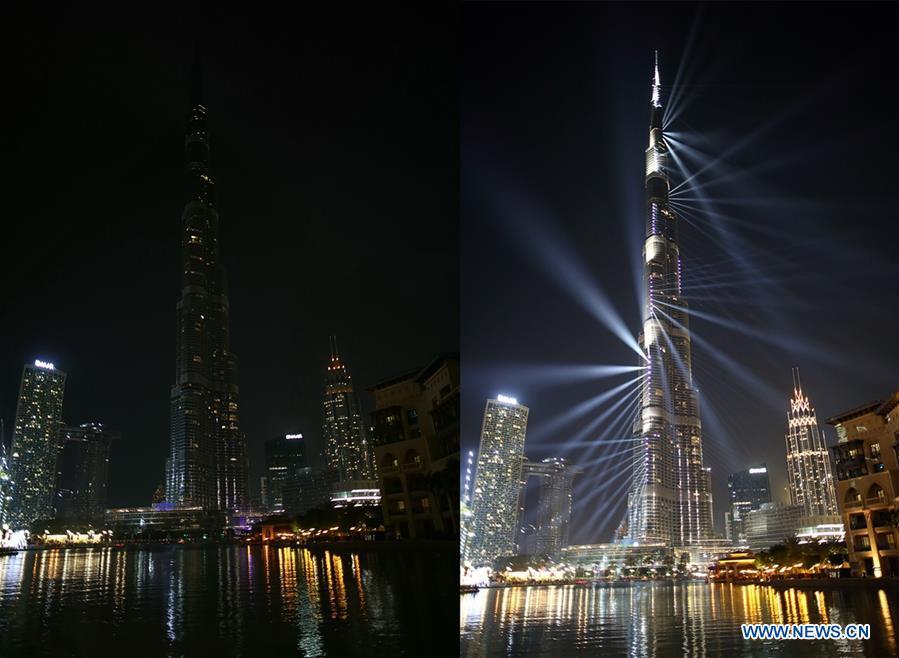 Combo photo taken on March 30, 2019 shows lights on (R) and off of Burj Khalifa, the world\'s tallest building, before and during the Earth Hour event in Dubai, the United Arab Emirates. Earth Hour is a global initiative first launched by World Wildlife Fund (WWF) in 2007 and soon became a popular movement worldwide. (Xinhua/Mahmoud Khaled)