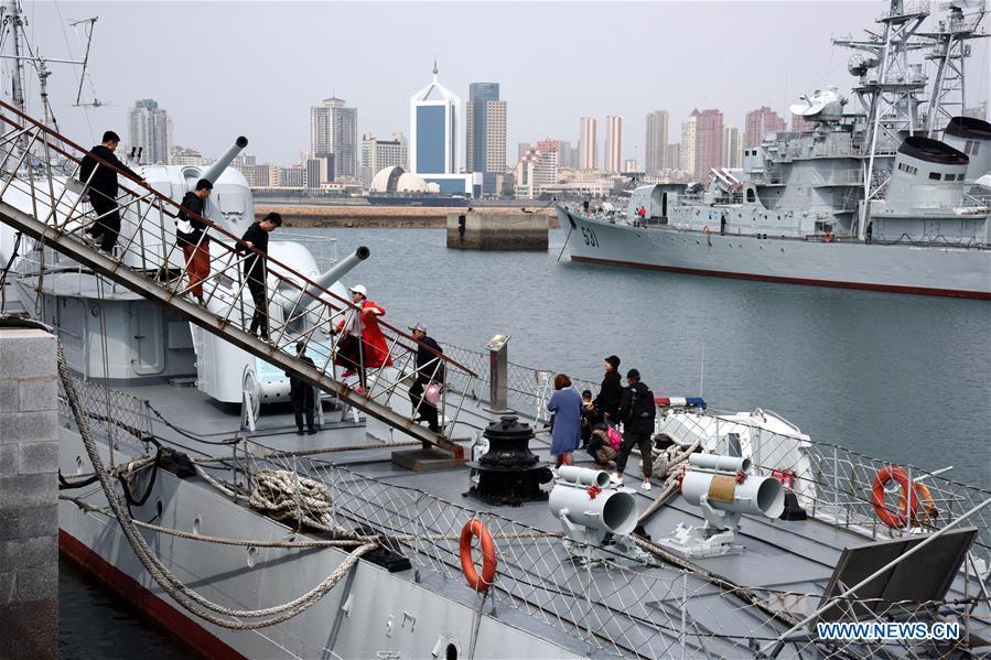 People visit a ship in the Chinese Navy Museum in Qingdao, east China\'s Shandong Province, April 16, 2019. (Xinhua/Li Ziheng)