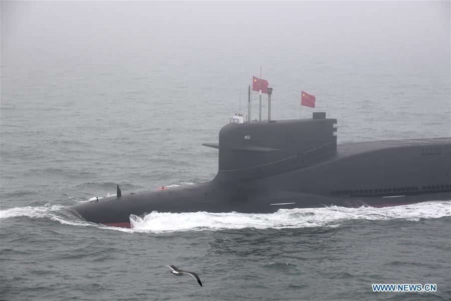 A new type of nuclear submarine of the Chinese People\'s Liberation Army (PLA) Navy is reviewed during a naval parade staged to mark the 70th founding anniversary of the PLA Navy on the sea off Qingdao, east China\'s Shandong Province, on April 23, 2019. (Xinhua/Li Ziheng)