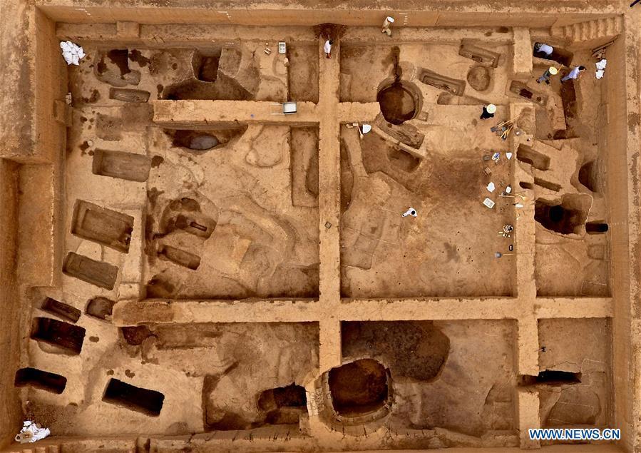 Aerial photo taken on June 5, 2019 shows the family tomb of bronzeware artisans of the Shang Dynasty in Anyang, central China\'s Henan Province. Archaeologists in central China\'s Henan Province said they have identified 42 tombs unearthed since 2017 to be a family tomb of bronzeware artisans dating back over 3,000 years. (Xinhua/Li An)
