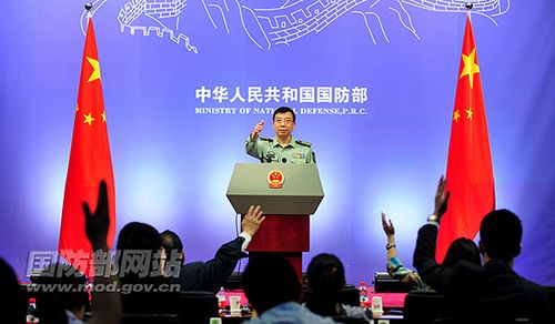 Geng Yansheng, Defense Ministry spokesman, answers questions at a press conference.