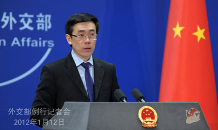 Chinese Foreign Ministry spokesman Liu Weimin attends a regular press conference on January 12, 2012.