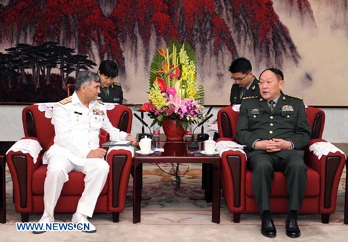 Chinese State Councilor and Defense Minister Liang Guanglie (R) meets wiht Pakistani Chief of the Naval Staff Muhammad Asif Sandila in Beijing, capital of China, April 25, 2012. (Xinhua/Xie Huanchi)