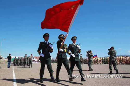 The officers and men from the Chinese People's Liberation Army are undergoing inspection. (Photo by Li Xiang / Xinhua)