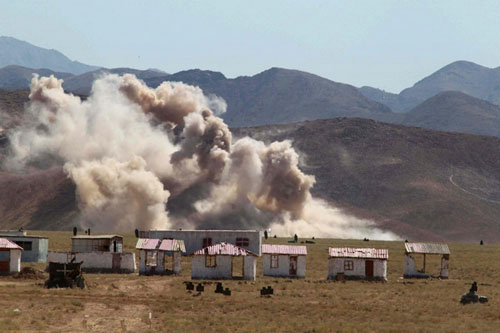 Photo taken on June 14, 2012 show the combat practice scene of the Peace Mission 2012 joint anti-terrorism military exercise in Khujand, Tajikstan. [Photo/Xinhua]