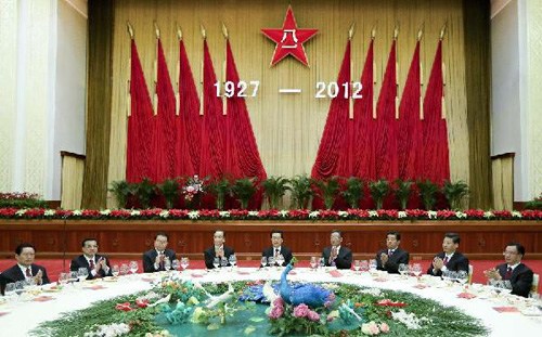 Chinese top leaders Hu Jintao, Wu Bangguo, Wen Jiabao, Jia Qinglin, Li Changchun, Xi Jinping, Li Keqiang, He Guoqiang and Zhou Yongkang attend a grand reception to mark the 85th anniversary of the founding of the People's Liberation Army (PLA), in Beijing, capital of China, July 31, 2012. (Xinhua/Lan Hongguang)