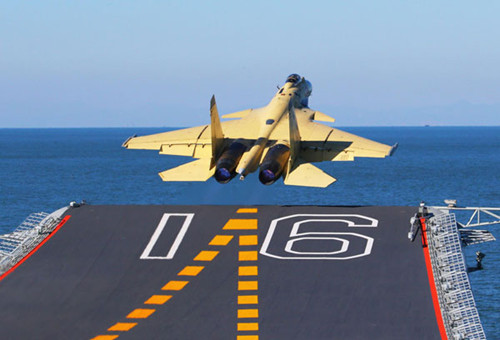 A J-15 fighter jet prepares to take off from China's first aircraft carrier, the Liaoning. [Undated photo/Xinhua]