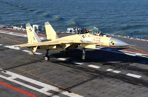 A J-15 fighter jet takes off from China's first aircraft carrier, the Liaoning. [Undated photo/Xinhua]