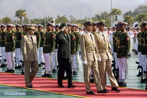 Deputy Chief of General Staff of the Chinese People 's Liberation Army Qi Jianguo (C) inspects the honor guards in Nay Pyi Taw, capital of Myanmar, on Jan. 20, 2013. Qi jianguo arrived here Saturday for the first China-Myanmar strategic security consultation. (Xinhua/U Aung) 