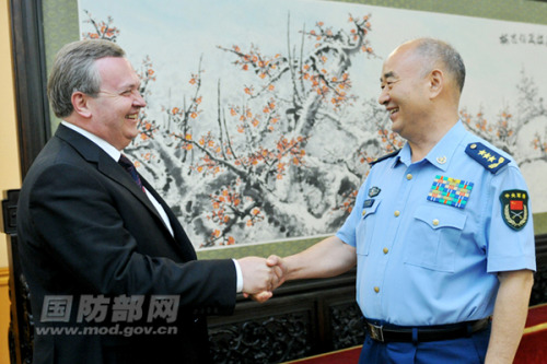 Gen. Xu Qiliang, vice chairman of the Central Military Commission (CMC) of the Peoples Republic of China (PRC), meets with Oleksandr Oliynyk, the visiting first deputy minister of defense of Ukraine, on the afternoon of May 27, 2013 in Beijing. (Photo by Li Xiaowei)